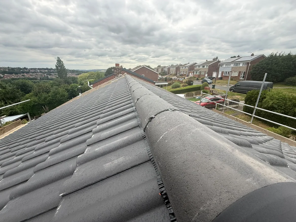 Dry ridge system fitted on new grey tiles