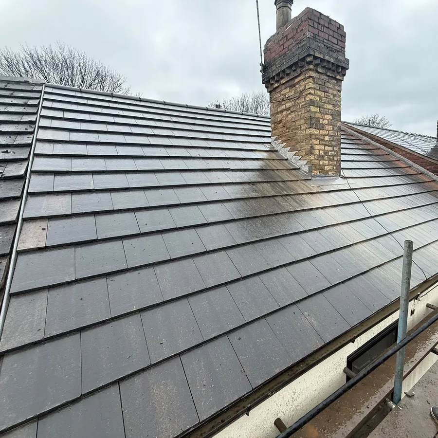 New tiled roof on a terrace, leadwork round the chimney